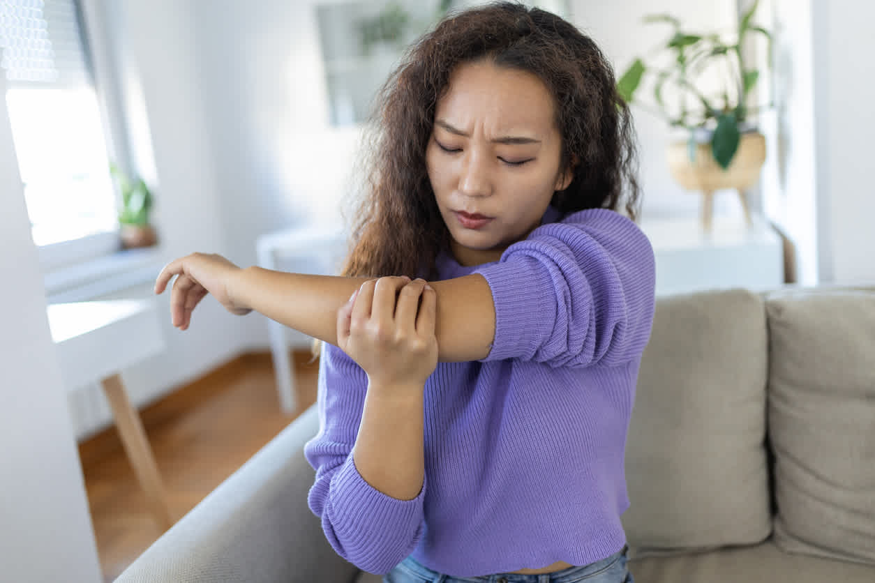 a-woman-with-inner-elbow-pain