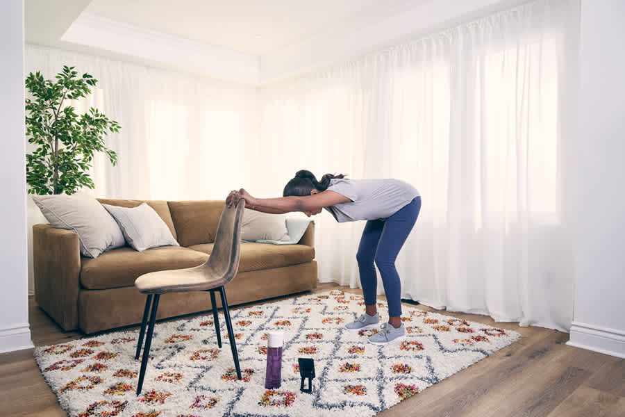 woman-at-home-doing-Standing-Childs-Pose