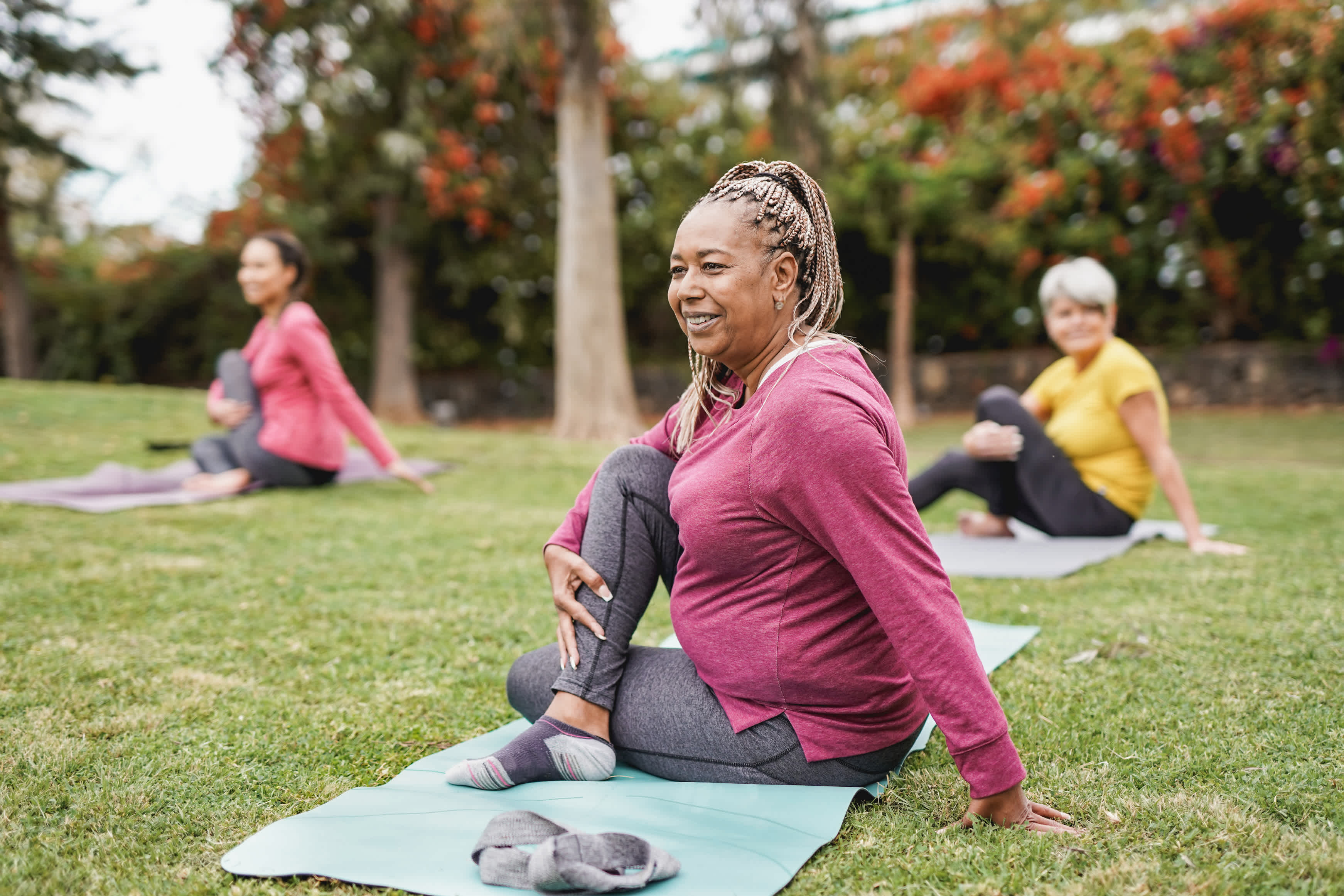 Women doing yoga stretches