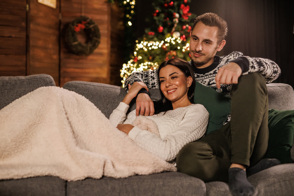 couple on couch during holidays
