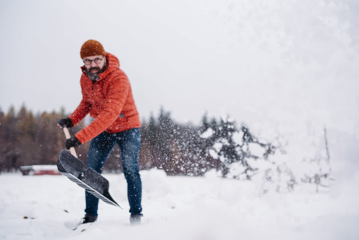 Man shoveling snow. 