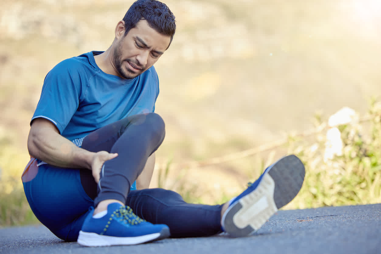 man-with-calf-pain-after-outdoor-work-out