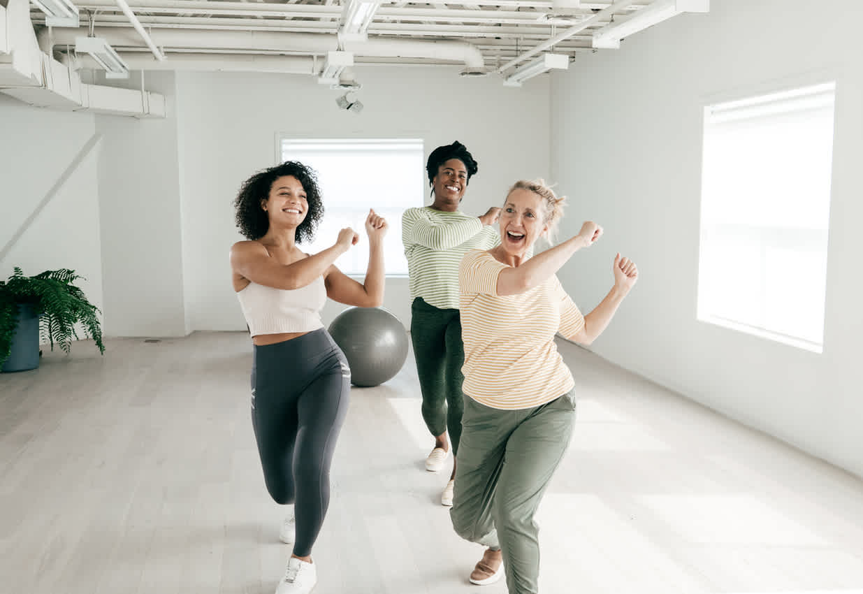 Three-women-laughing-at-dancing-class