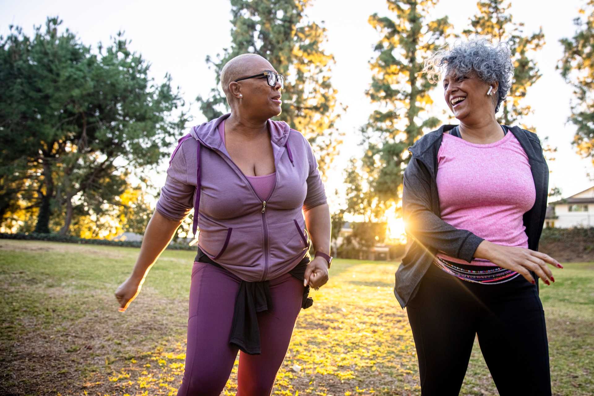 Two-black-women-walking-for-exercise-in-the-morning-is-walking-good-for-arthritis-in-the-knee