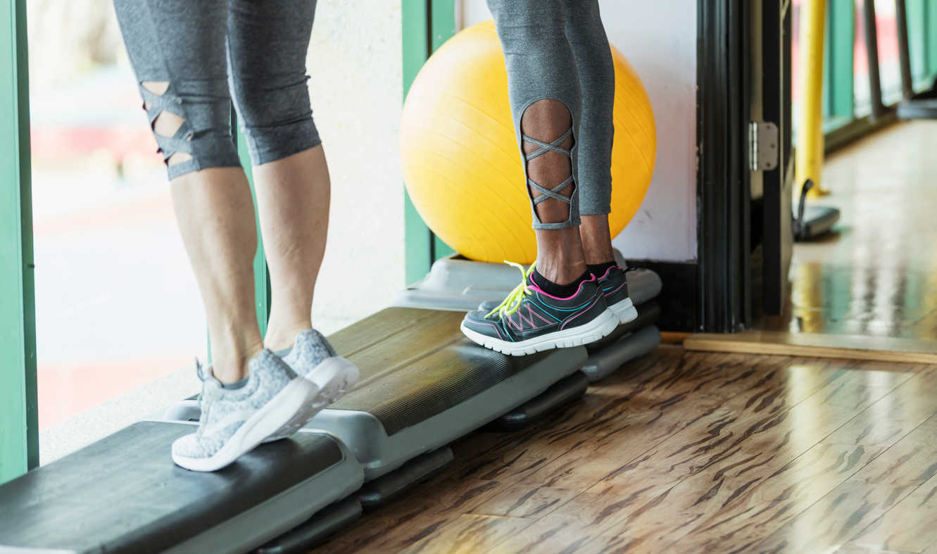 Two women doing calf strengthening exercises