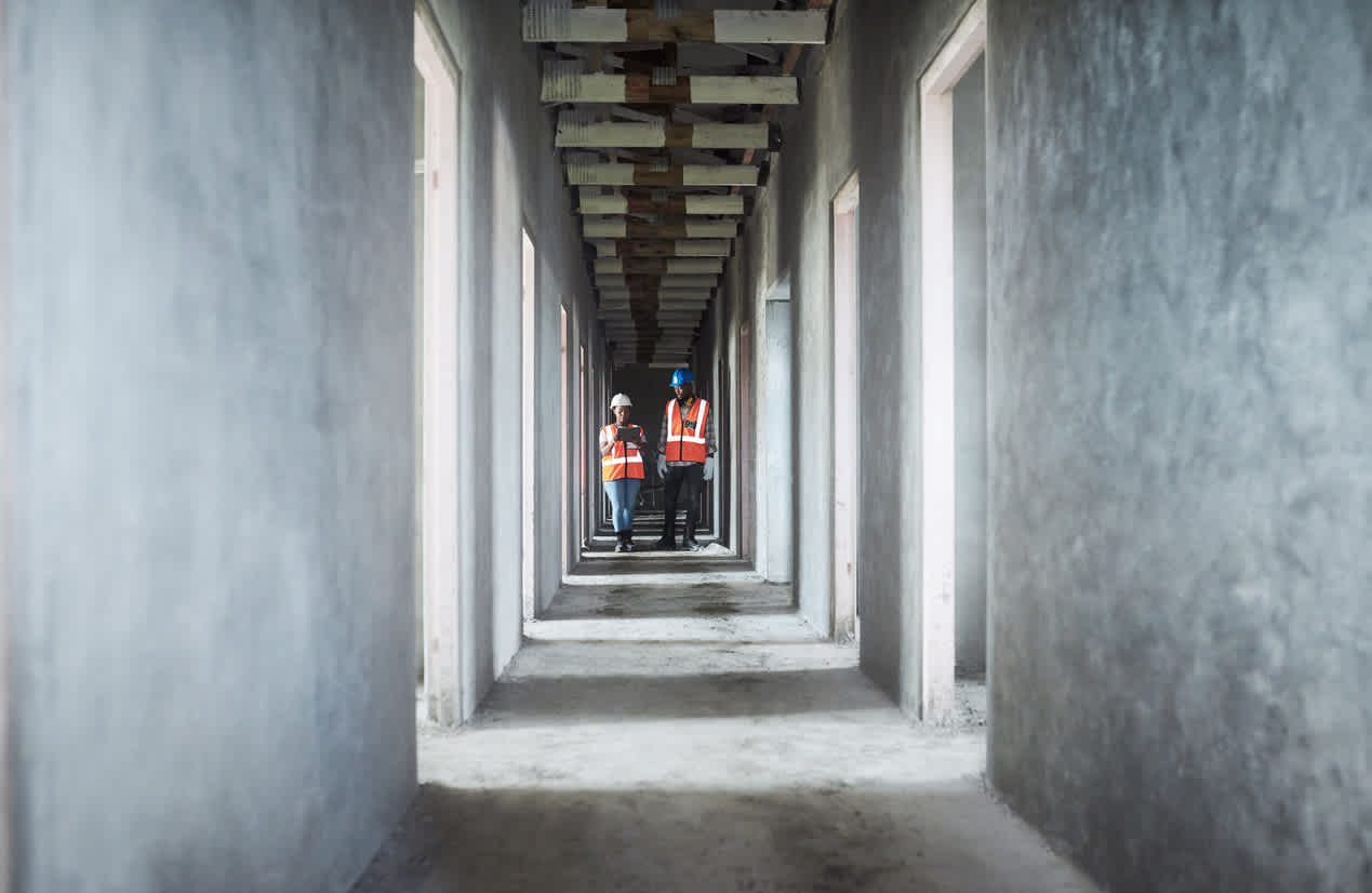 two-workers-in-a-building