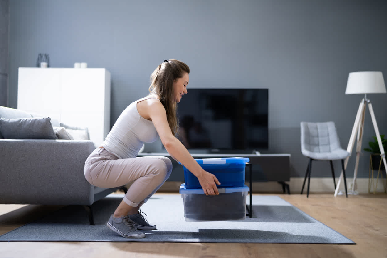 woman-lifting-heavy-object