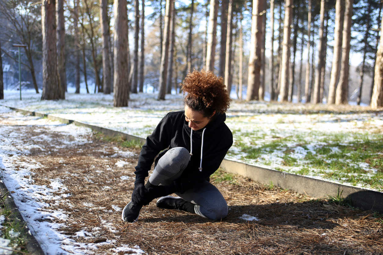 woman-suffering-ankle-pain-after-walking-due-to-ankle-bursitis