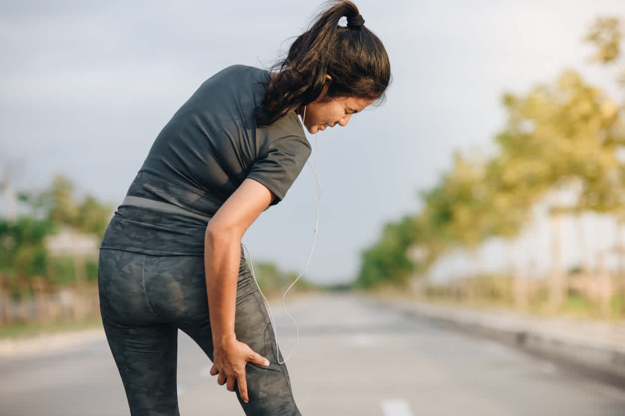 woman-touching-her-hamstring-in-pain