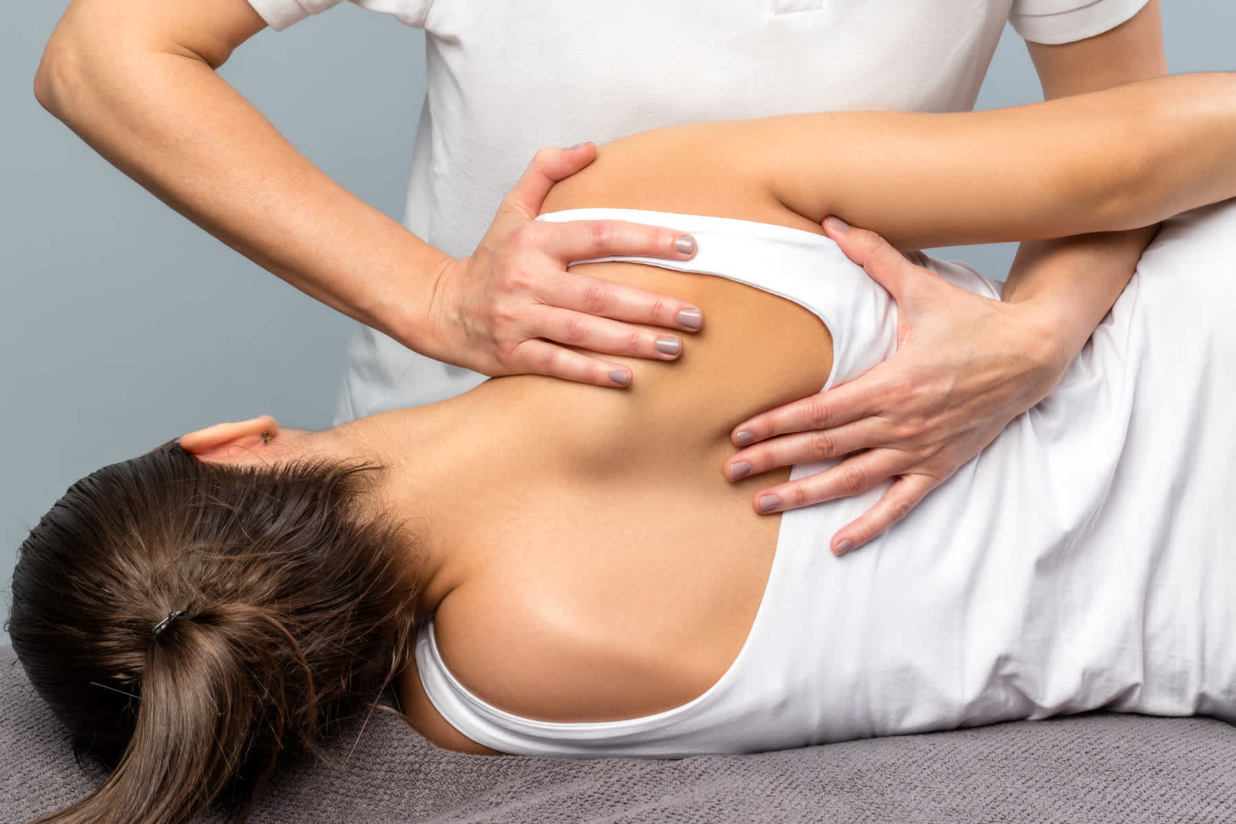 Woman receiving a shoulder massage