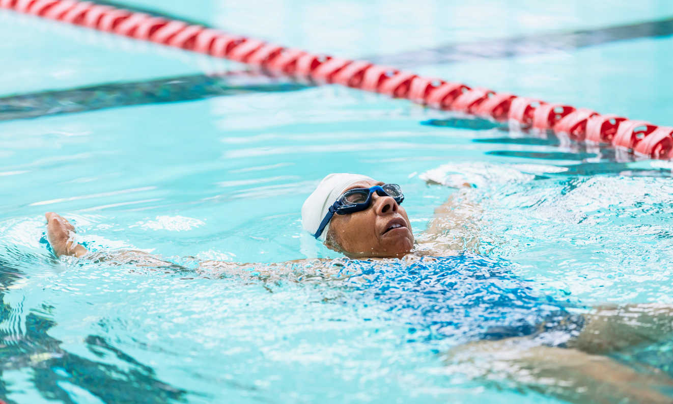 woman thinking if is swimming good for back pain