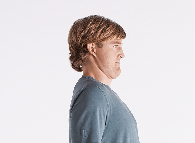 man-doing-chin-tucks-exercise