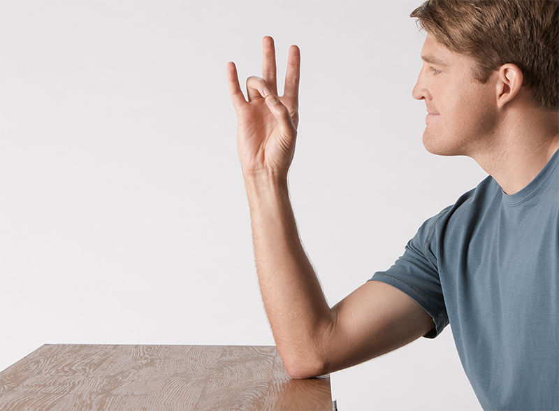 man-practicing-hand-strengthening-exercises