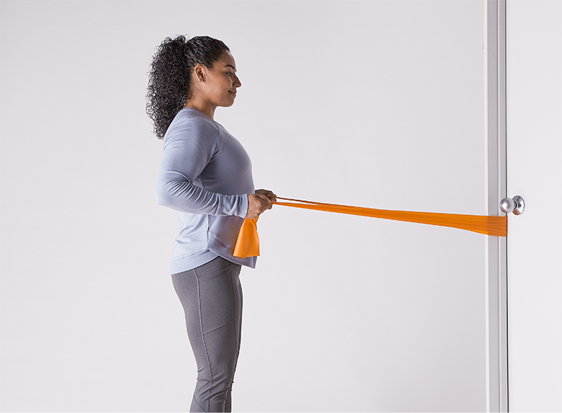 woman-doing-shoulder-rows-exercises-with-band